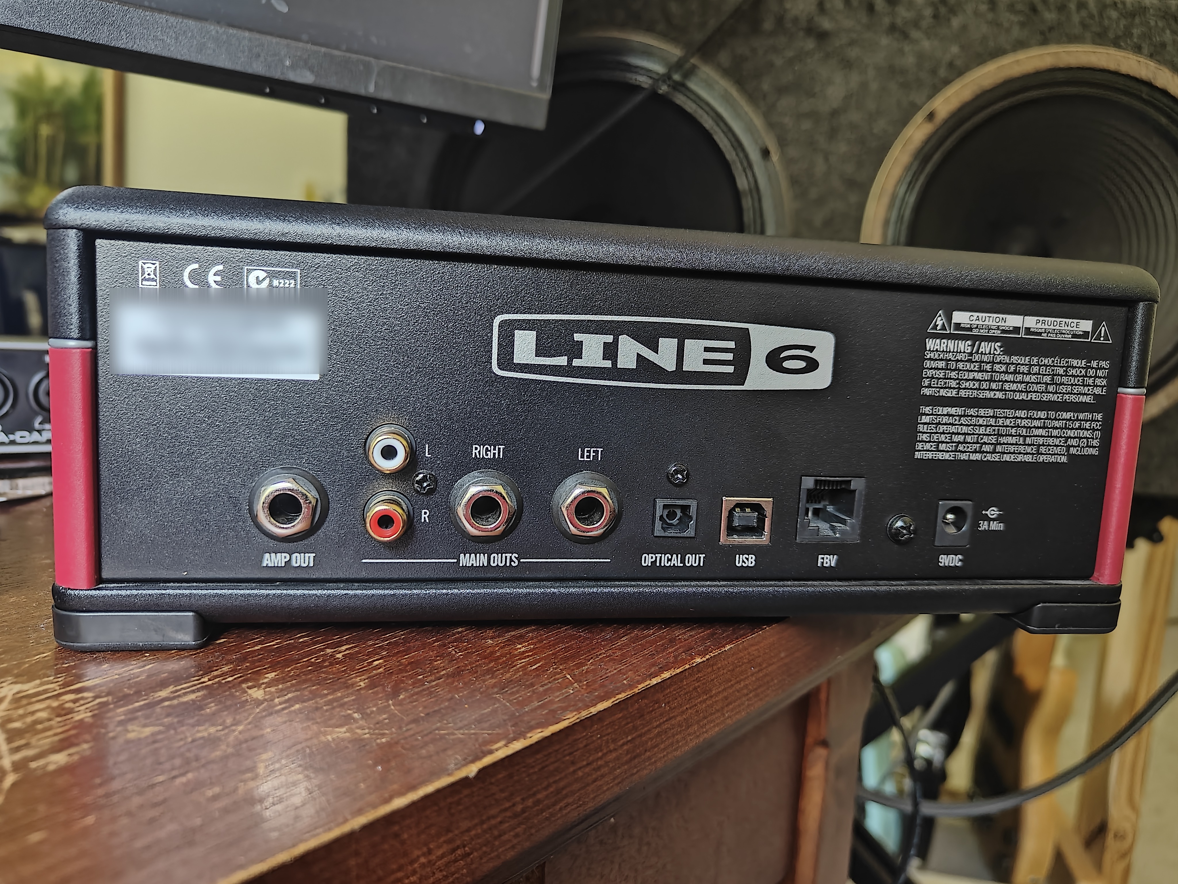 The rear of the AMPLIFi TT, with its amp, RCA, main, optical, USB, FBV, and power connections