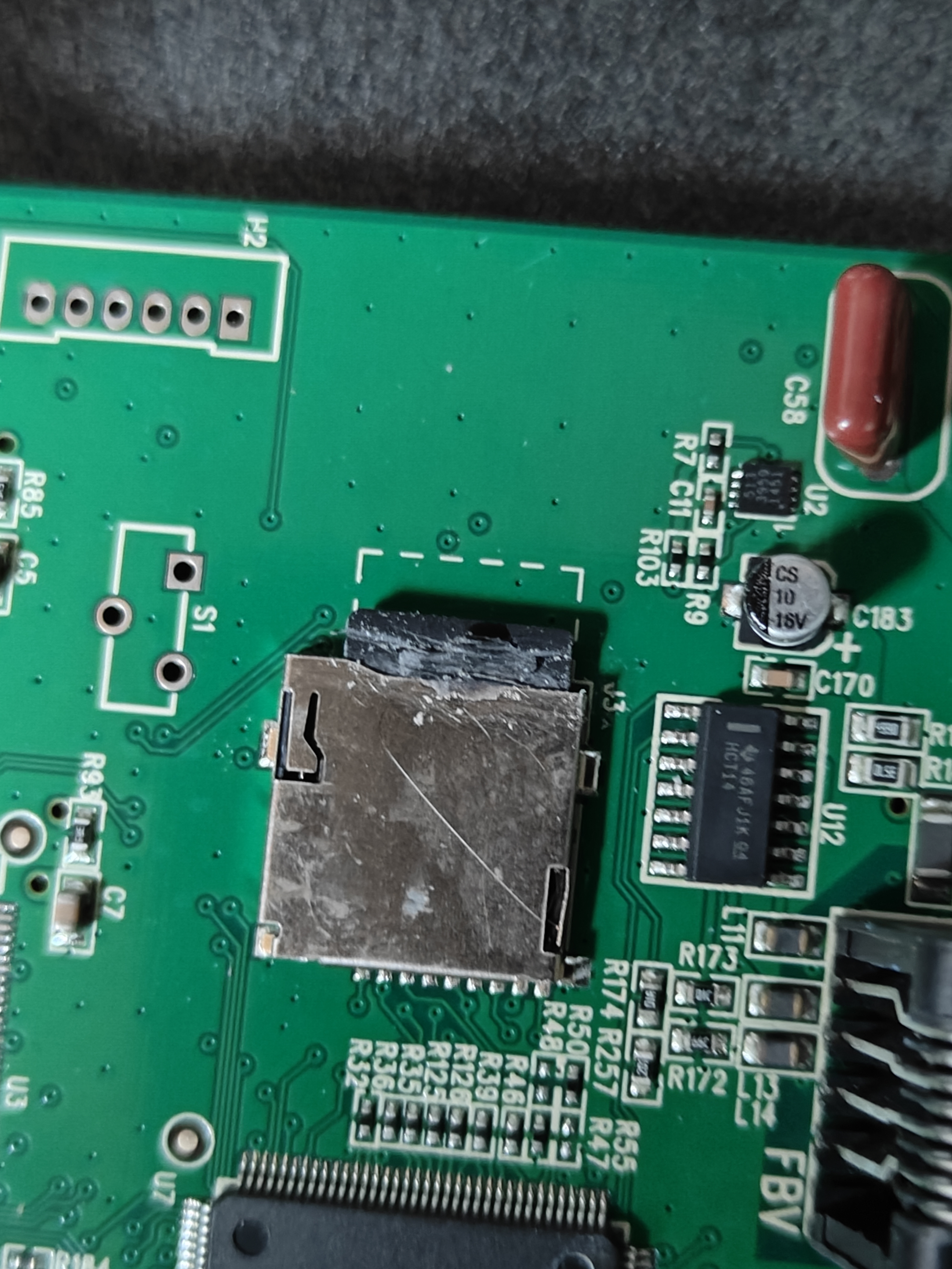 The AMPLIFi TT microSD card still glued into its socket
