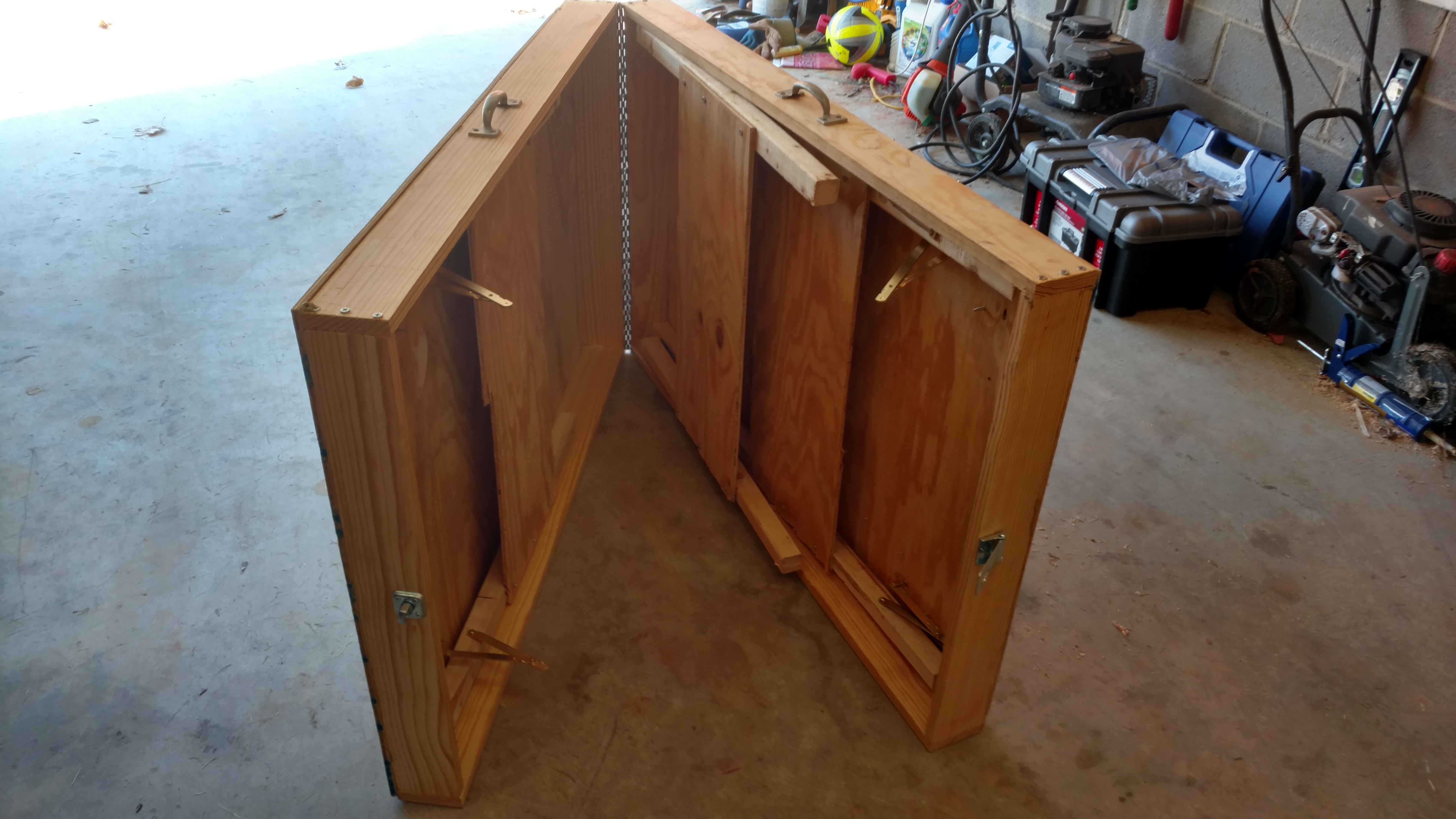 Starting to unfold it, you can see how the legs store away.