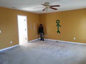 Leah in Master Bedroom next to Art
